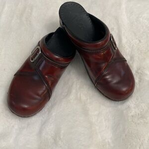 Dansko Dark Antiqed Brick Red Clog with Buckle. Size 39